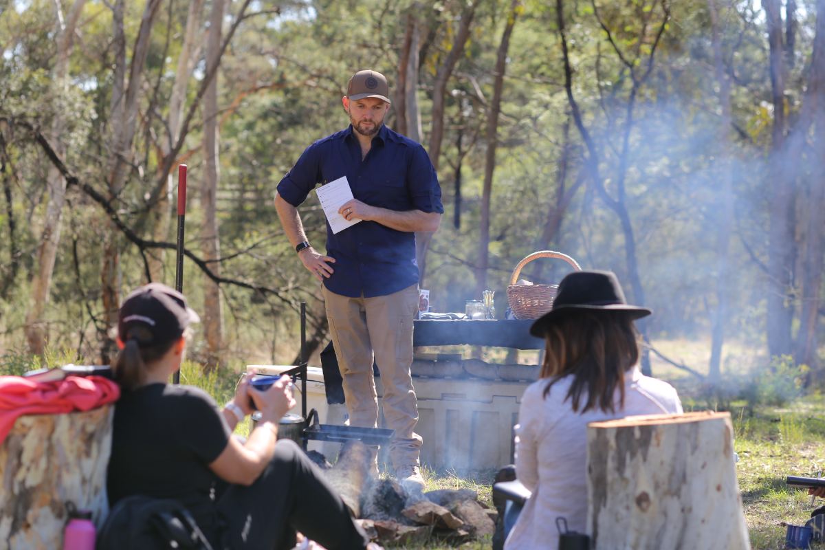 Trent addressing the group at the fire